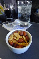  Mixed nuts with red wine and water on United Airlines
