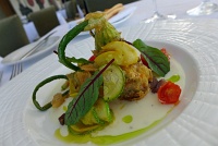  Squash Blossoms stuffed with lobster, pancetta, baby squash, heirloom cherry tomatoes, goat cheese mornay at 