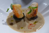  Le crabe royal: Roasted king crab, served over a spiced eggplant soup