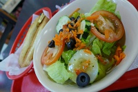  Cugino's Italian Deli: Side salad with italian dressing and garlic bread