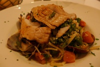  Emeril's New Orleans Fish House: Pan-roasted great lakes white fish with manilla clams, hickory bacon, broccolini and white wine broth with linguine pasta