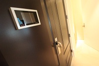  Room door with security camera
