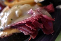  Open-faced Reuben sandwich (Corned beef and Swiss cheese with sauerkraut and Russian dressing on pumpernickel with French fried potatoes) at Lindy's, Midtown Manhattan