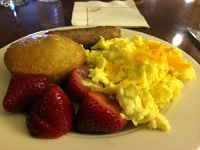  Sponge cake muffin with strawberries, scrambled eggs, and sausage at Marriott Fort Collins