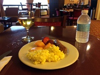  Scrambled eggs with canteloupe, strawberries, sausage, and apple juice at Fort Collins Marriott
